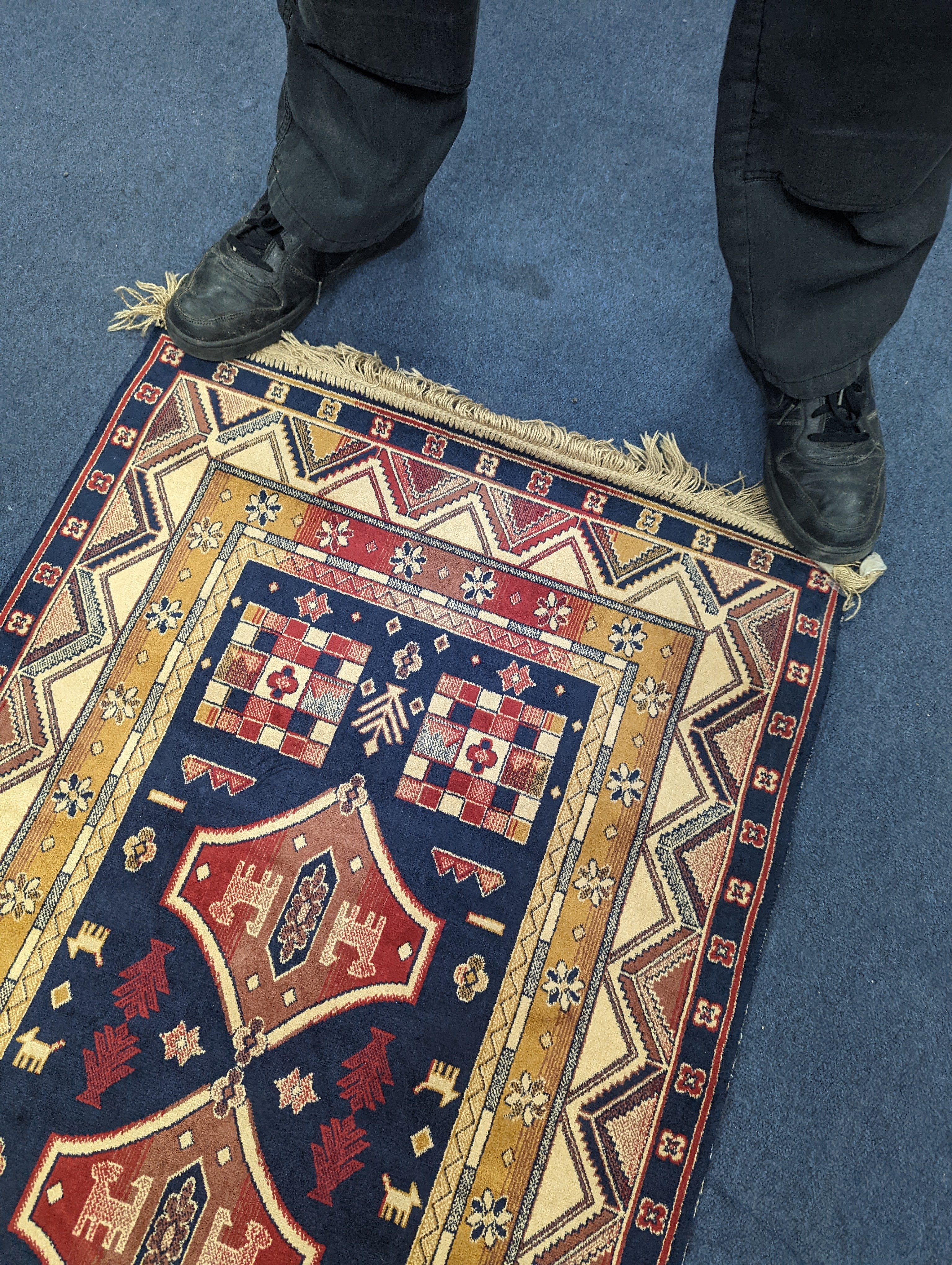 A small Caucasian style runner, 230 x 69cm